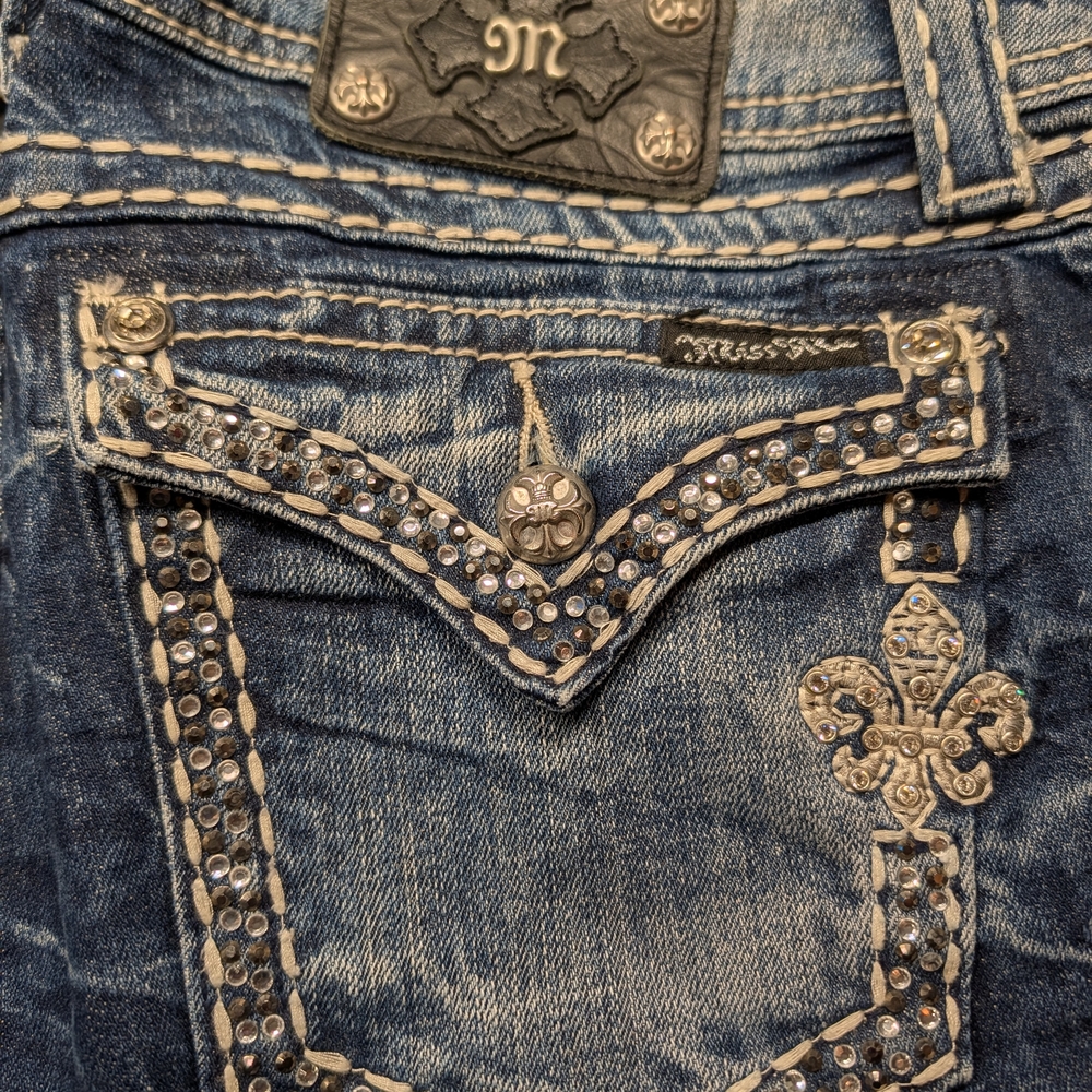 Elegant Blue Boot Cut Jeans with Embellished Pocket
